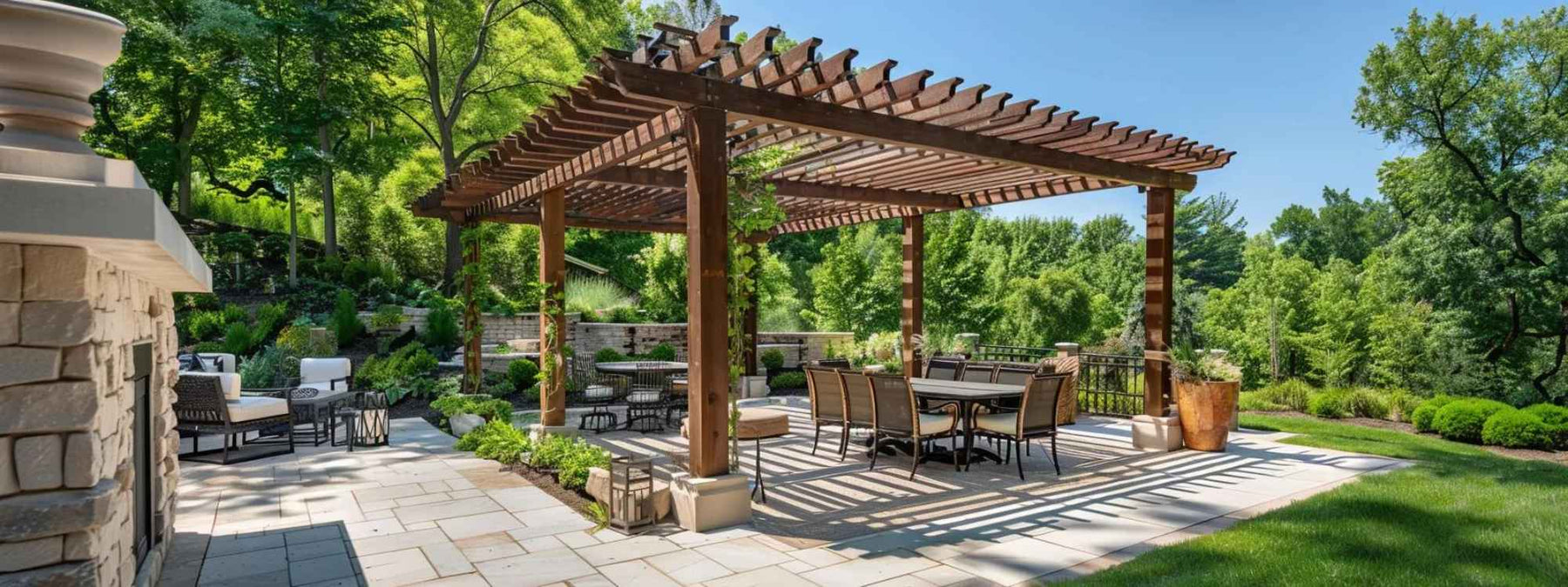 A large wooden pergola sits in the center of a well-landscaped backyard, showing an open roof that highlights the need to learn How to Cover a Pergola from Rain