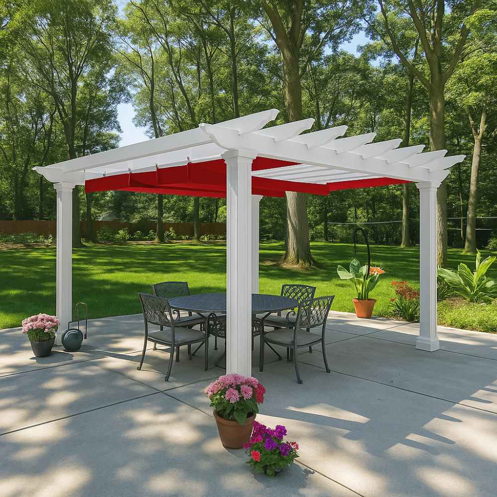A white free-standing Structureworks Atlas Aluminum Pergola with a bright red canopy shades a round patio table in a wooded backyard