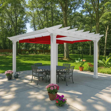 A white free-standing Structureworks Atlas Aluminum Pergola with a bright red canopy shades a round patio table in a wooded backyard