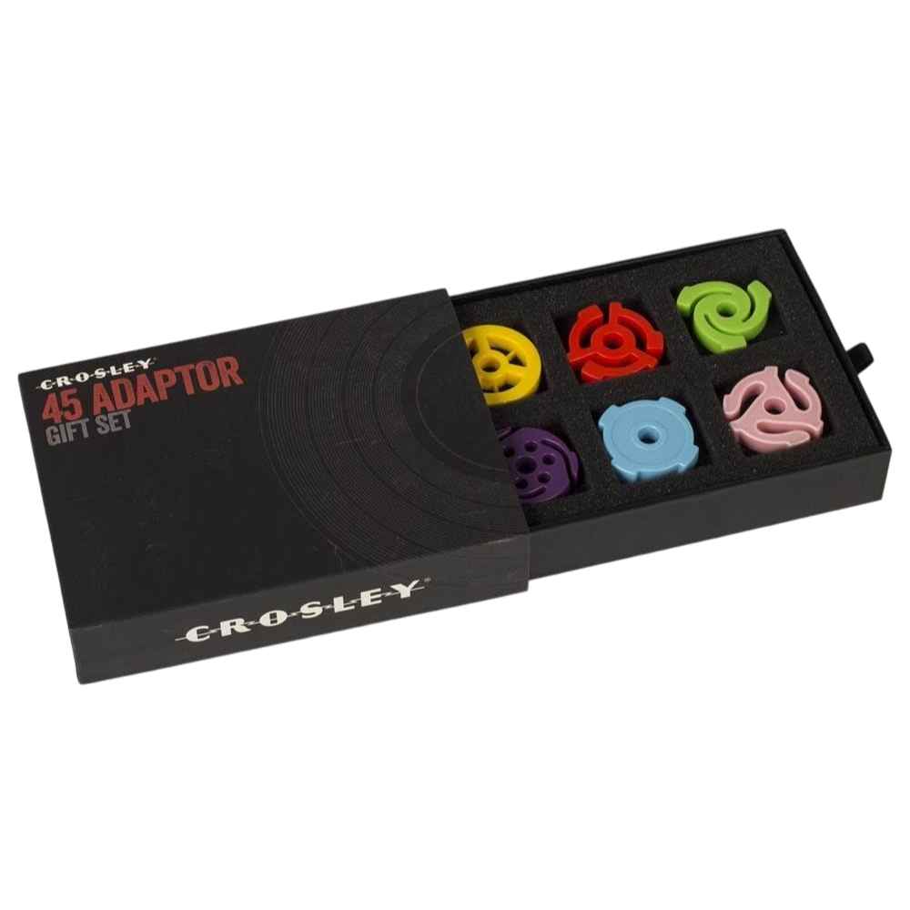 A black box labeled Crosley 45 Adaptor Gift Set slides open to reveal six colorful 45 RPM record adaptors in foam compartments