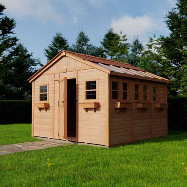 A bright, fresh-looking Outdoor Living Today 12×12 Sunshed Garden Shed stands on green grass, with its door ajar and sunlight reflecting off its many clear roof panels