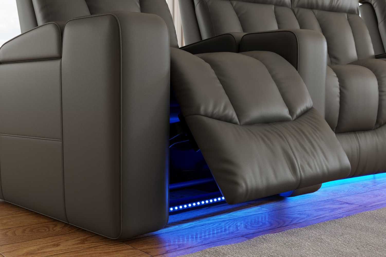 A close-up of Valencia Olivia Home Theater Seating's footrest in reclined mode, highlighting its smooth leather surface and LED-lit base