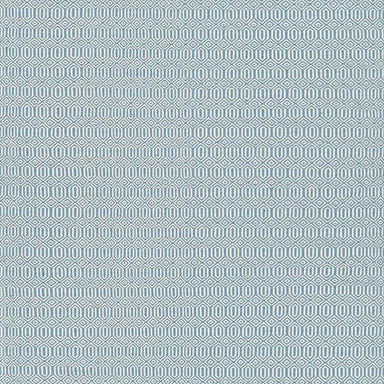 A close-up view of the Couristan Cottages Indoor/Outdoor Rug - Southport/Denim, featuring a repeating geometric pattern in denim blue and ivory