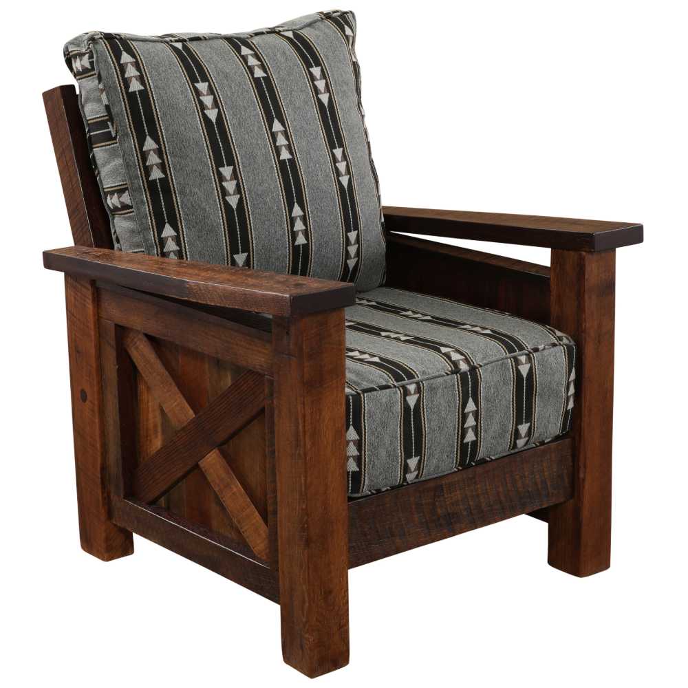 Angled to the side, the Fireside Lodge Barnwood Lounge Chair highlights its earthy wood tones and matching patterned cushions in gray and black
