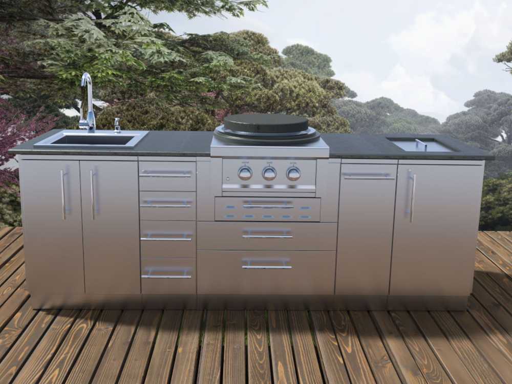An outdoor view of the Sunstone Mongo 8ft Outdoor Grill & Cabinet Island Package shows the entire unit on a deck with trees in the background