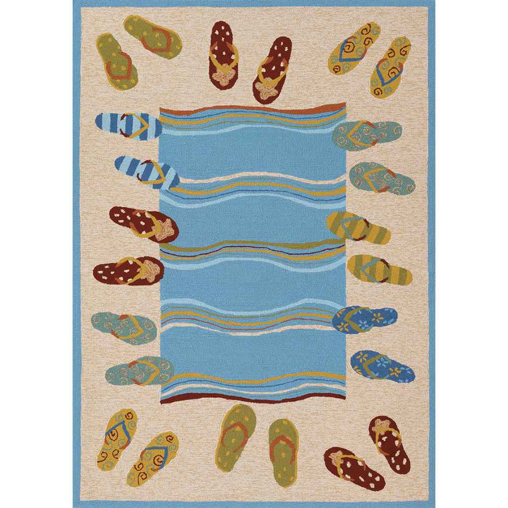 A rectangular version of the Couristan Covington Indoor/Outdoor Rug - Sandals/Sand-Multi shows a full beach towel-inspired pattern with flip-flops surrounding wavy water