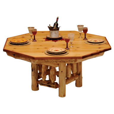 A rustic Fireside Lodge Poker Table Cover for 8-Sided - Natural, crafted from cedar logs with an octagonal shape, set for dining with elegant plates and glasses