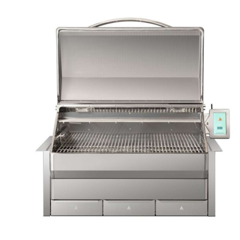 A side-angle view of the Memphis Grills Elite Built-In ITC3 displays its sleek, closed stainless steel lid and a digital control panel mounted on the right