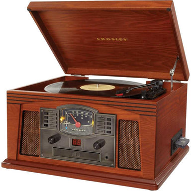 Crosley Lancaster Entertainment Center - Paprika is a wooden music player with a turntable under a hinged lid, playing a vinyl record