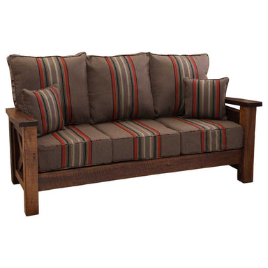 Fireside Lodge Barnwood Sofa from an angle, showcasing its full striped cushions, matching throw pillows, and detailed wooden armrests