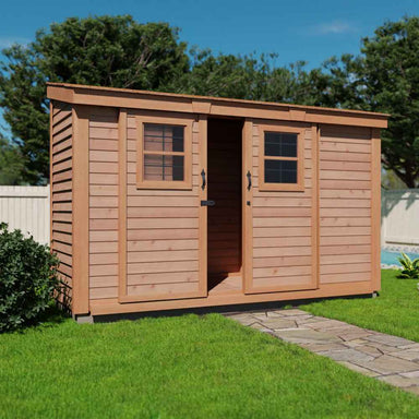 Outdoor Living Today 12×4 with Sliding Doors SpaceSaver Storage Shed displays another angle with the left door open and surrounded by grass and plants