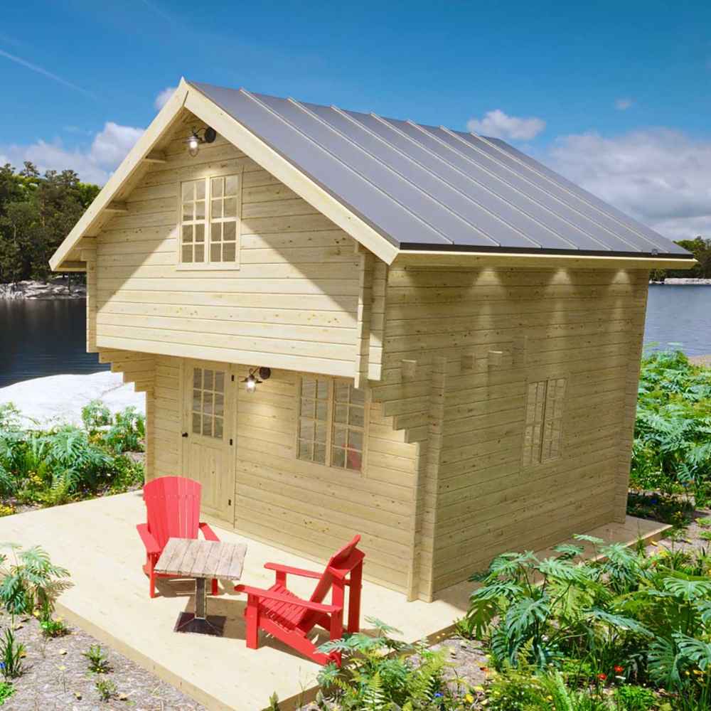 Sawmill Structures Ontario Grand Loft 107 SD Garden Room is a charming two-story wood cabin with a patio and red chairs by the lake