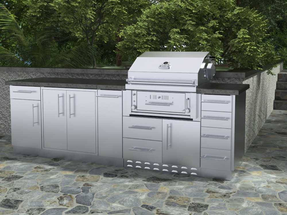 Sunstone Alamo 9ft Outdoor Hybrid Gas Charcoal Grill & Cabinet Island Package is installed on a stone patio surrounded by lush greenery and tall trees