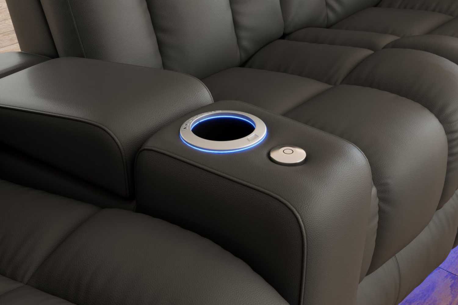 Valencia Olivia Home Theater Seating’s cup holder with a glowing blue LED ring and a control button