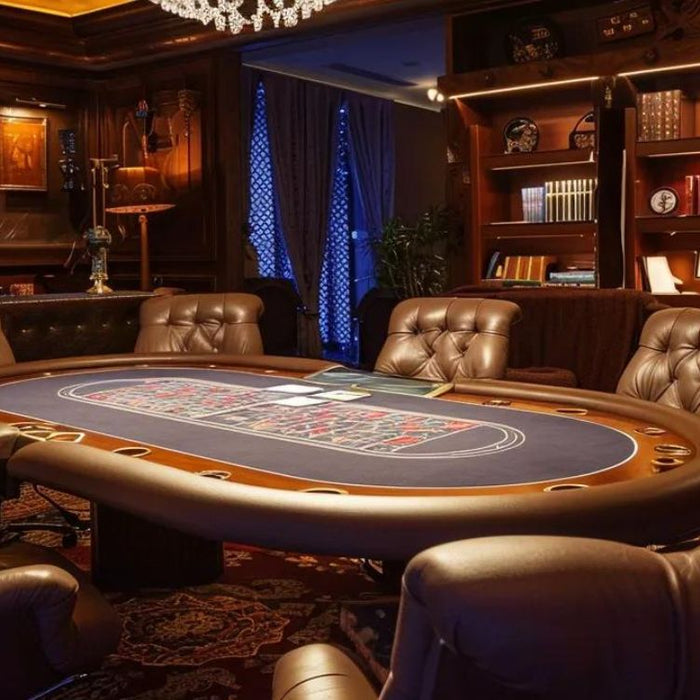 A luxurious room features a large poker table surrounded by plush leather chairs, perfect to set up the best poker table room at home