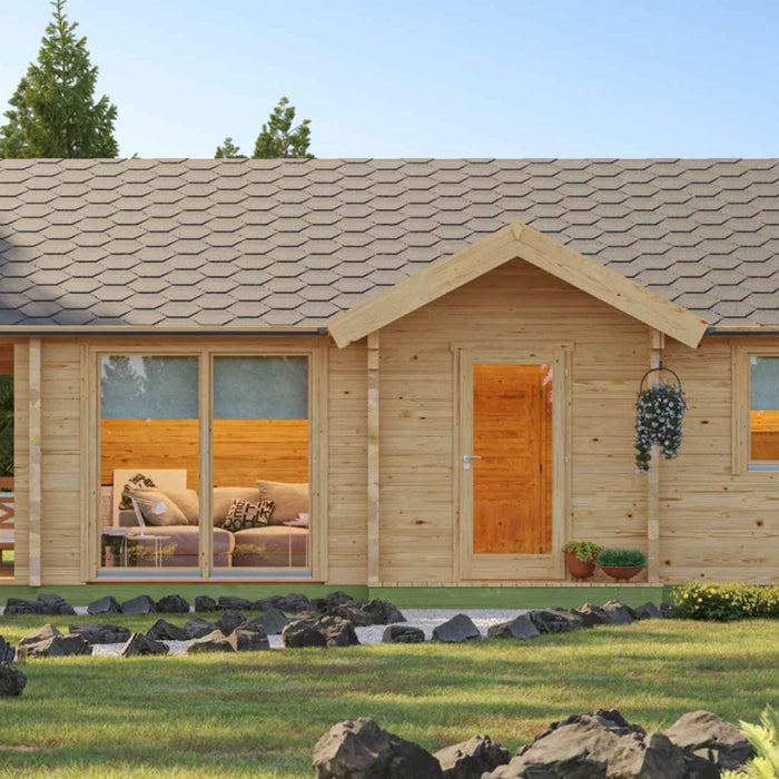 A modern wooden tiny house with a covered porch and large front windows offers the perfect setting to explore 12 Ways to Decorate Your Modern Tiny House