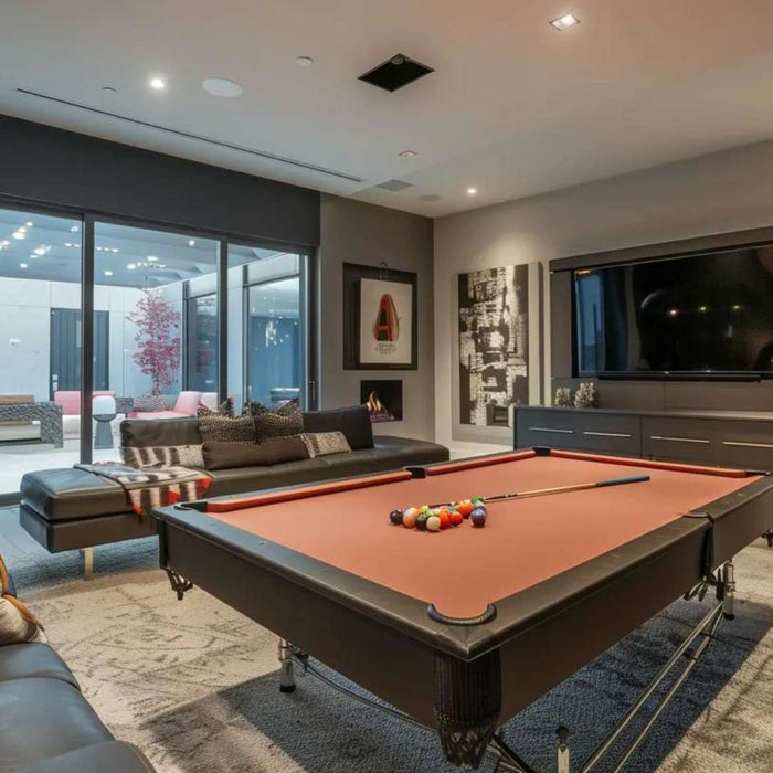 A stylish indoor lounge with floor-to-ceiling windows, a pool table centerpiece, and soft lighting—demonstrating How to Build the Ultimate Man Cave for relaxation and fun