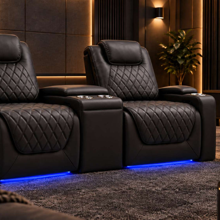 Black leather home theater seating with console features quilted recliners, built-in cup holders, blue LED lighting, and a large cinema screen