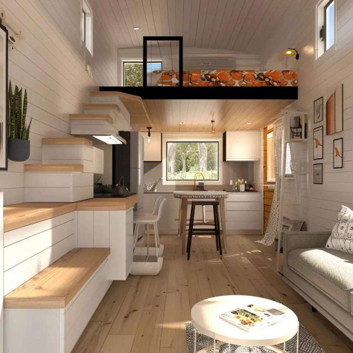 Compact white shed interior with loft bed, storage stairs, small kitchen, and sofa, perfect for she shed ideas on a budget