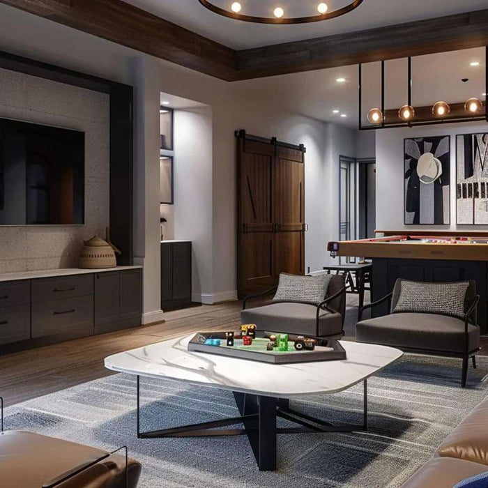 Cozy modern man cave with leather seating, a sleek TV wall, and a pool table in the back shows why a man cave is important for relaxation and personal space
