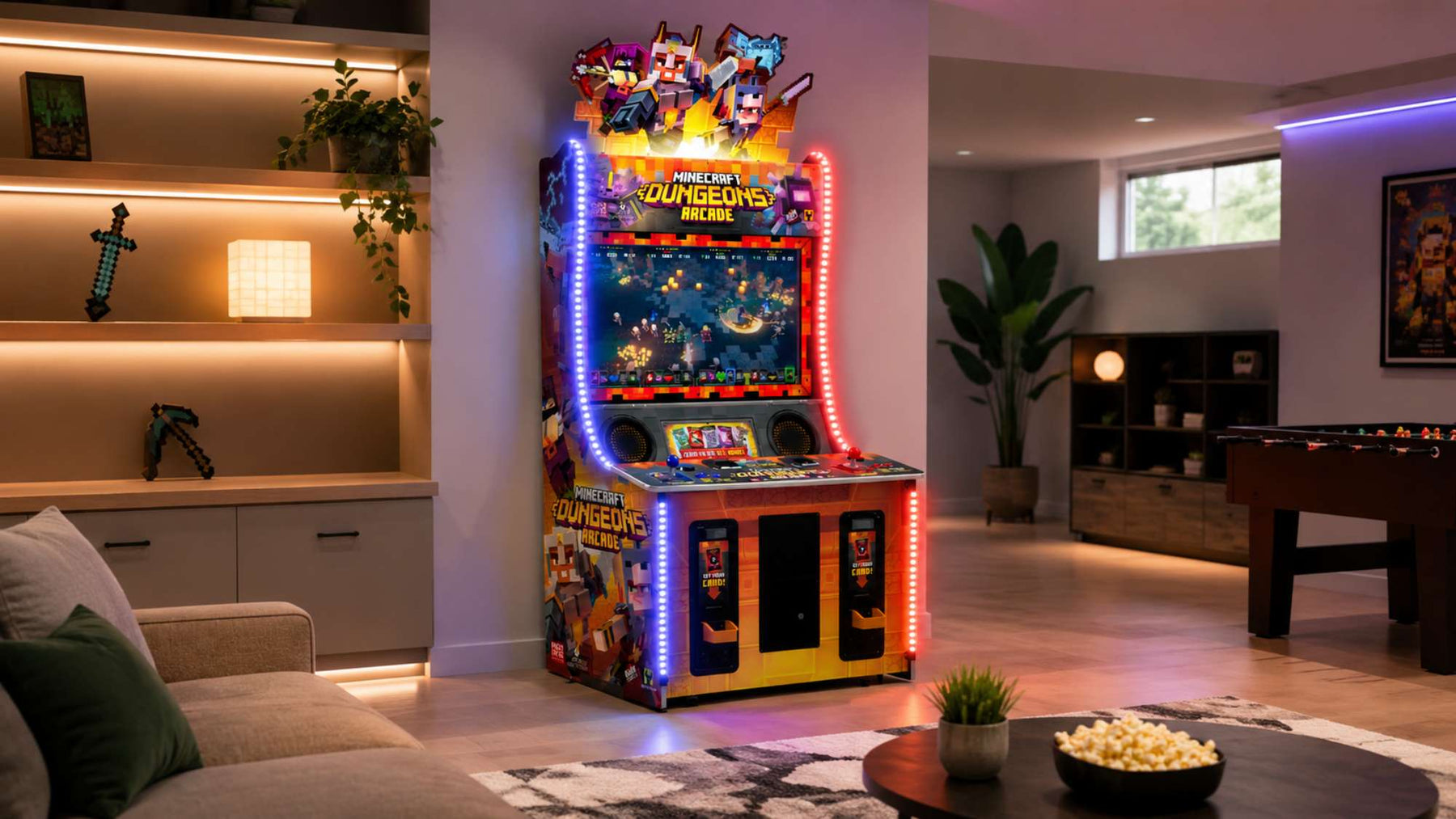 Minecraft arcade machine in a cozy modern game room with glowing LED lights, a sofa, shelving, plants, and a foosball table