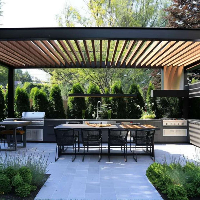 Modern covered patio with grills, prep counters, and shaded seating designed for efficient outdoor kitchen meal prep