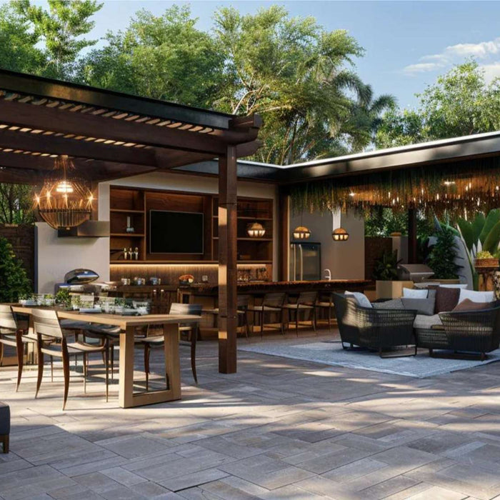 Modern outdoor patio with a wooden pergola, dining table, lounge seating, and kitchen area, ideal for a pergola corporate event rental space