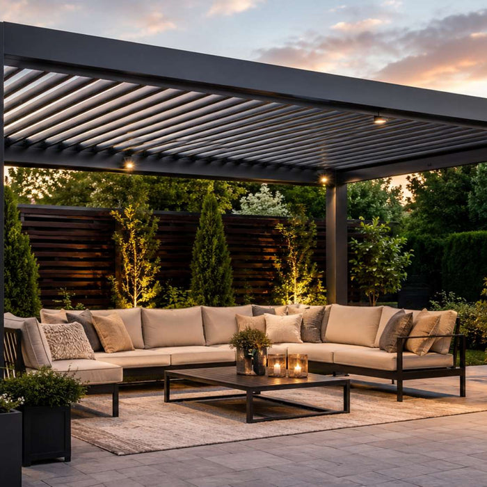 Modern waterproof pergola with outdoor lounge furniture on a spacious backyard patio beneath an adjustable louvered roof