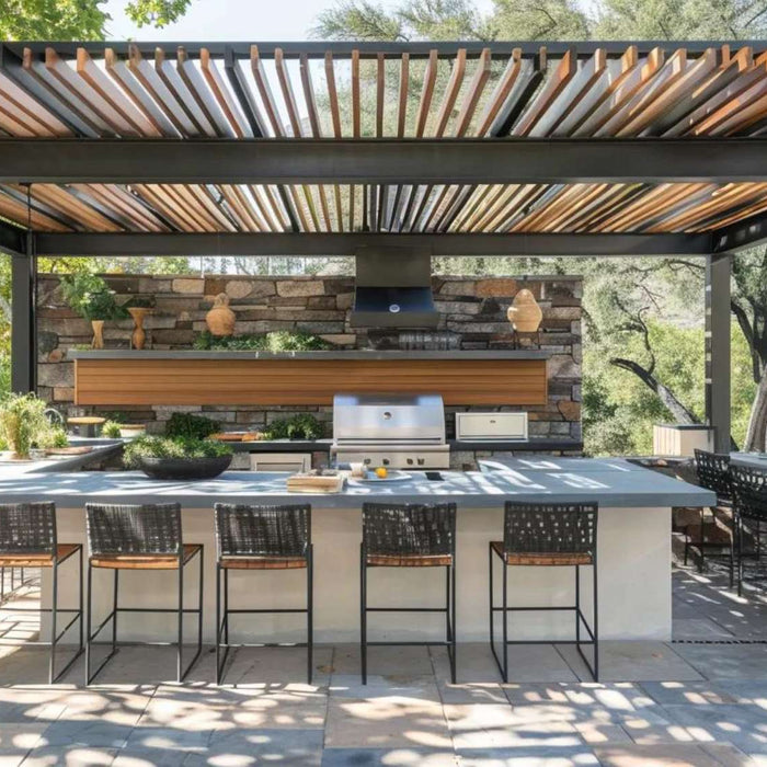 Outdoor kitchen photography of a modern pergola-covered kitchen with bar seating, stone accents, and natural light filtering through overhead slats