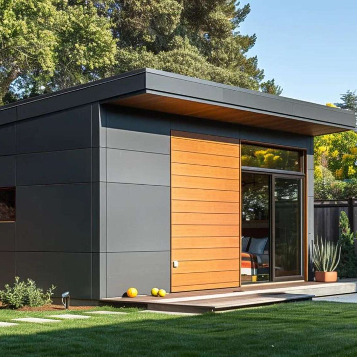 Sleek she shed in a landscaped backyard with seating and large windows, illustrating how can someone live in a she shed comfortably