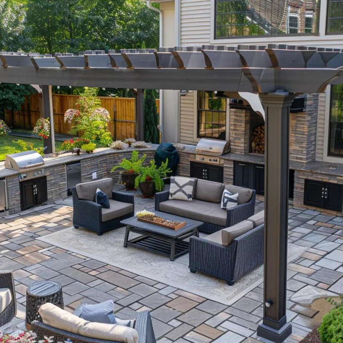 Spacious patio with a pergola covering a seating area and a full outdoor kitchen setup, showcasing outdoor living structures for high-end homes