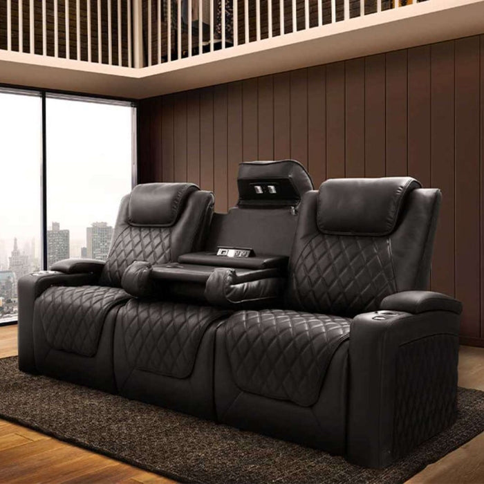 The Valencia Oslo Console Edition Home Theater Seating stands out in a luxurious high-rise apartment setting with a stunning cityscape backdrop