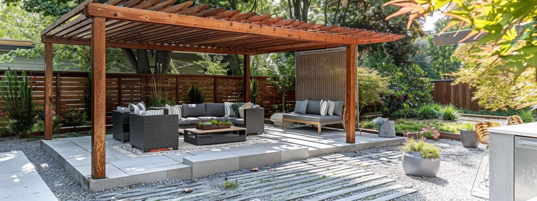 Wooden pergola shading a modern outdoor seating area on a raised patio, highlighting the question how long does wooden pergola last outdoors