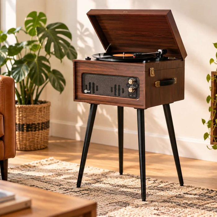 Wooden record player with stand sits in a bright living room beside a leather chair, plants, and a shelf of vinyl records