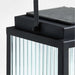 13 inch Crate & Barrel Alfresco Black Metal and Glass LED Solar Outdoor Lantern in an alternate view showing the removable solar panel on top