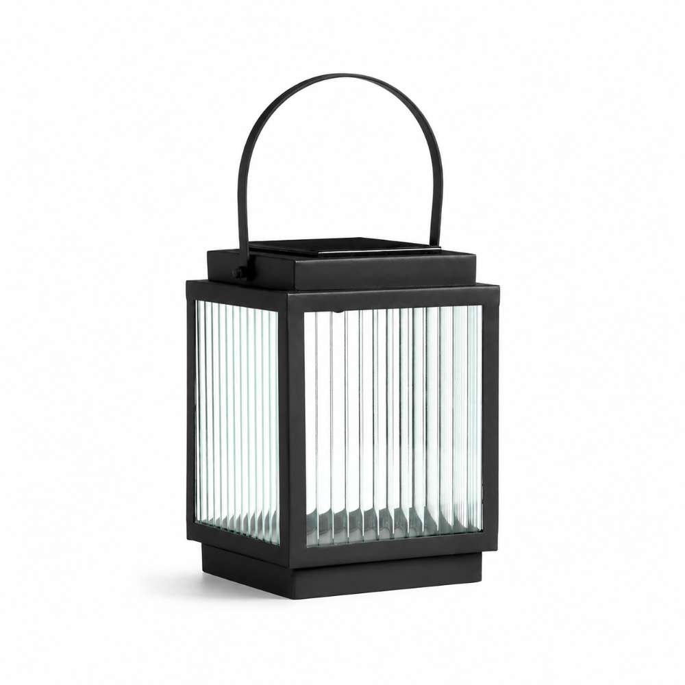 13 inch Crate & Barrel Alfresco Black Metal and Glass LED Solar Outdoor Lantern shown from a second angle