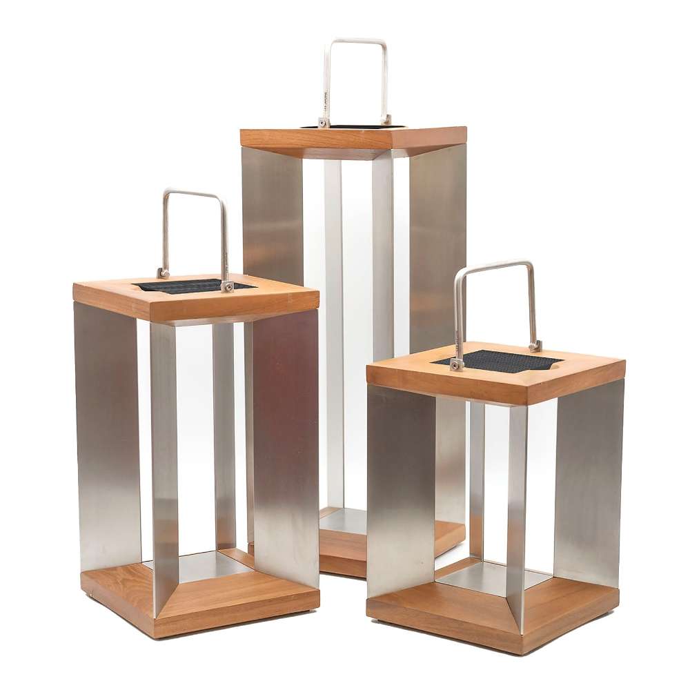 14 inch, 18 inch and 26 inch Crate & Barrel Blade Teak and Stainless Steel LED Solar Outdoor Lantern shown together in weathered teak and stainless steel