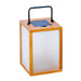 16 inch Crate & Barrel Les Jardins Tradition Teak LED Outdoor Solar-Powered Lantern with frosted panels in a weathered teak frame and a stainless steel handle
