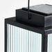19 inch Crate & Barrel Alfresco Black Metal and Glass LED Solar Outdoor Lantern in an alternate view showing the removable solar panel on top