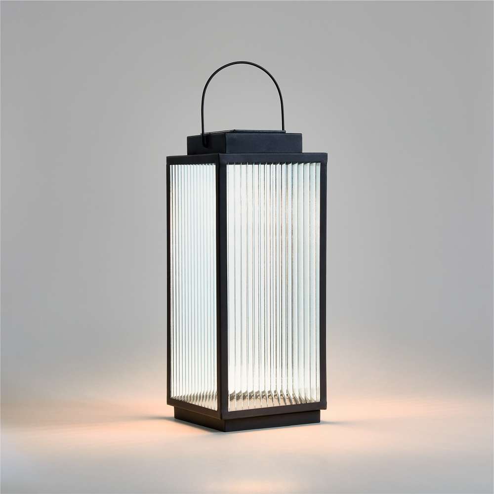 19 inch Crate & Barrel Alfresco Black Metal and Glass LED Solar Outdoor Lantern in matte black powdercoated steel with reeded glass panels