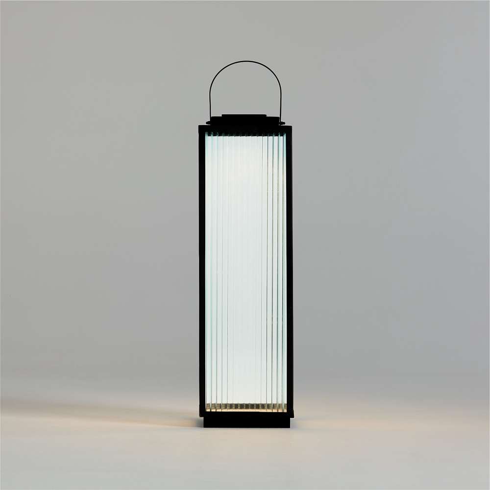 26.5 inch Crate & Barrel Alfresco Black Metal and Glass LED Solar Outdoor Lantern in matte black powdercoated steel with reeded glass panels