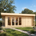 Rectangular light wood cabin with glass doors showing an office interior, set on a lawn with trees.
