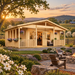 Glostrup 44 entertainment bar glowing at golden hour amid flowering dogwoods, vineyards, split-rail fencing, and rolling North Carolina Piedmont hills.