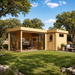 L-shaped light wood cabin with large glass windows and sliding doors used as an office in a grassy yard with trees.