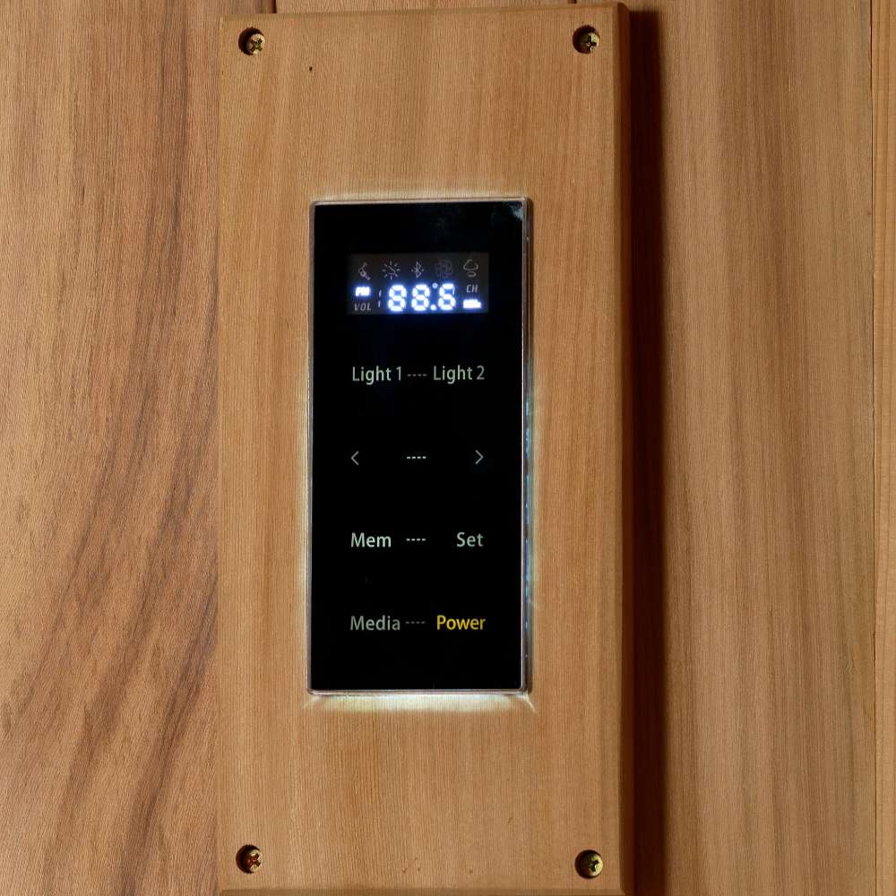 A black digital control panel with Light 1, Light 2, Mem, Set, Media and Power buttons sits in a cedar frame in Golden Designs Copenhagen 3 Person Traditional Sauna