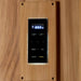 A black digital control panel with a lit display sits in a cedar frame on the wall of Golden Designs Osla 6 Person Traditional Sauna