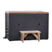A light wood step sits in front of Golden Designs Dynamic Cold Therapy Cuboid Plastic Cold Plunge Tub, a dark gray rectangular cabinet with cedar trim along the top