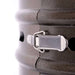 A silver latch clamps the collapsible sections together on the bronze body of Outdoor Order Axis Collapsible Heater