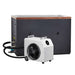 A white chiller with a large front fan connects by black hoses to the side fittings of Golden Designs Dynamic Cold Therapy Cuboid Plastic Cold Plunge Tub