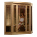 A woman in a white towel sits inside Golden Designs Maxxus 3 Person Low EMF Far Infrared Corner Sauna in Hemlock behind the bronze glass door